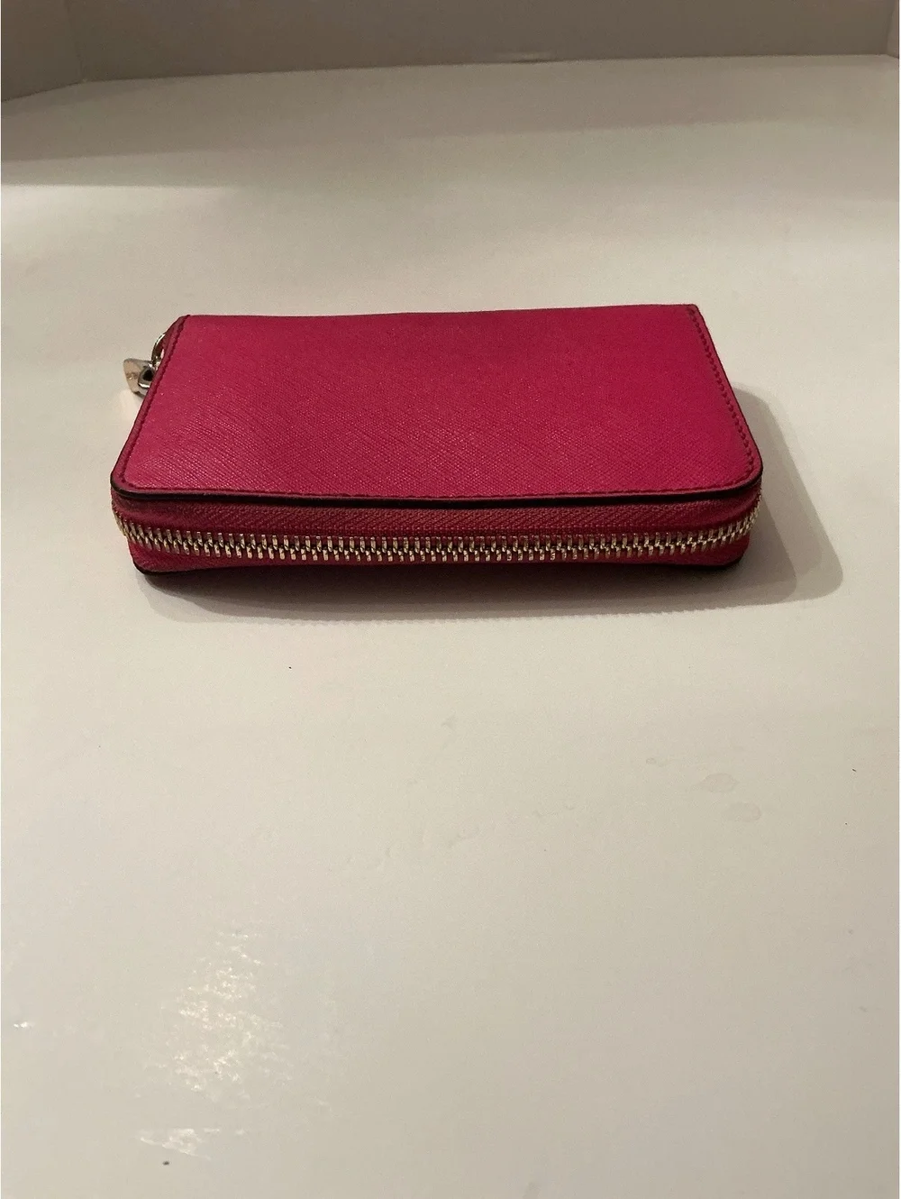 Michael Kors Pink leather zip-around wallet with logo and card slots